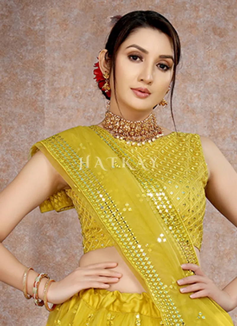 Yellow Mirror Work Embroidery Net Lehenga Choli